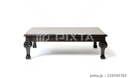 Large wooden table with carved legs and a black top Large wooden table with carved legs and a black top 129395765