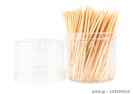 Toothpicks in a Clear Plastic Bottle on White Background 129395810