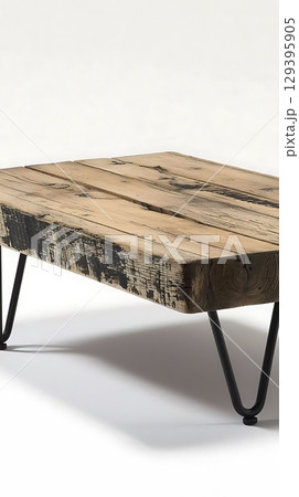 A wooden table with black legs and a black and white design 129395905