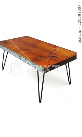 A wooden table with black legs and a brown top 129395907