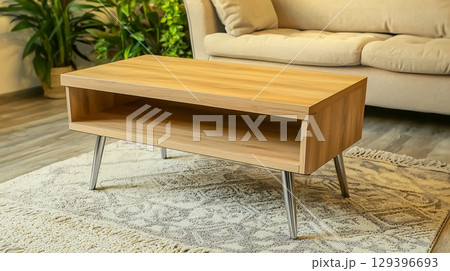 Wooden coffee table with a plant on top of it 129396693