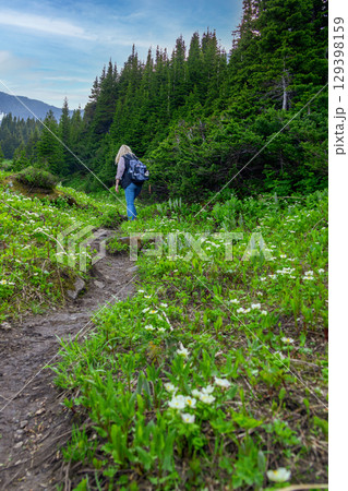 Female Hiker on Mountain Trail in Spring 129398159