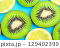 Vibrant Tropical Fruits on a Bright Minimalist Pastel Background in a Fresh Composition 129402399