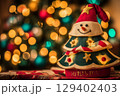Decorative Christmas Tree Lamp with Snowman Design and Soft Bokeh Background Effect 129402403