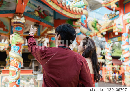 Festive Chinese New Year Travel Adventure with Vibrant Decorations and Cultural Celebrations 129406767