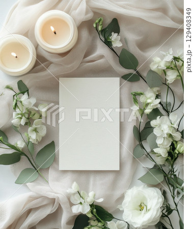 Elegant candlelit arrangement with fresh flowers indoor photography cozy setting top-down view calm aesthetic Elegant candlelit arrangement with fresh flowers indoor photography cozy setting top-down view calm aesthetic 129408349