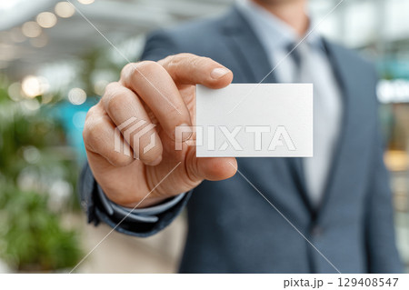 Man hand holding a business card. generative ai 129408547