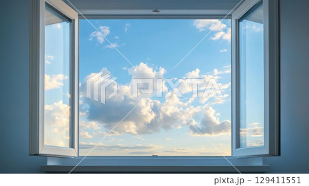 open window with blue sky and clouds 129411551