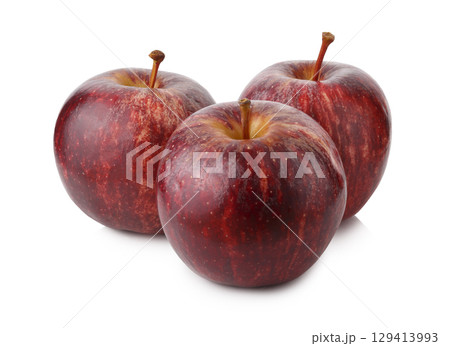 Fresh and Juicy Red Apple with Vibrant Skin isolated on a white background 129413993
