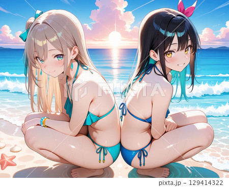 ビーチで楽しそうな笑顔の仲良し女性二人組 ビーチで楽しそうな笑顔の仲良し女性二人組 129414322