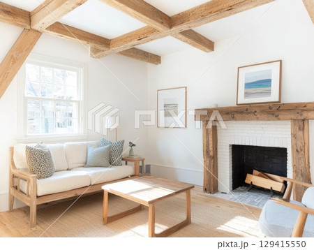Bright and airy rustic minimalist living room with exposed beams Bright and airy rustic minimalist living room with exposed beams 129415550