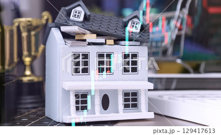 House model with money and stock market overlay 129417613