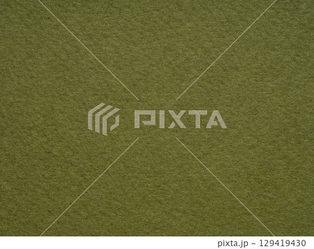 The texture of this olive green paper surface captures the essence of nature's own canvas 129419430