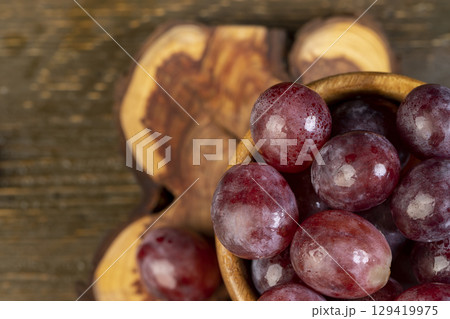 wet grapes after washing the berries, clean wet grapes safe for eating, top view 129419975