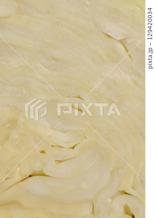 cut white cabbage during slicing for salad preparation, pieces of sliced white cabbage , details of fresh cabbage chopped into small pieces for convenience of cooking cut white cabbage during slicing for salad preparation, pieces of sliced white cabbage , details of fresh cabbage chopped into small pieces for convenience of cooking 129420034