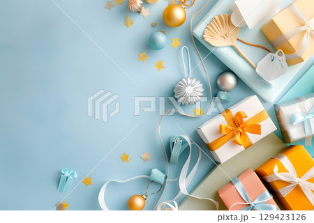 Colorful shopping items arranged with empty space for promotional text, ideal for marketing banners, sales ads, or social media. 129423126