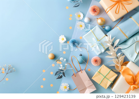 Colorful shopping items arranged with empty space for promotional text, ideal for marketing banners, sales ads, or social media. 129423139
