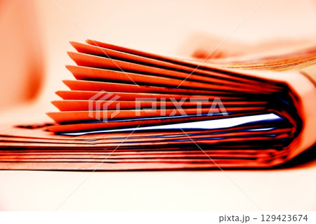 A stack of newspapers. They are ready for distribution to readers.  129423674