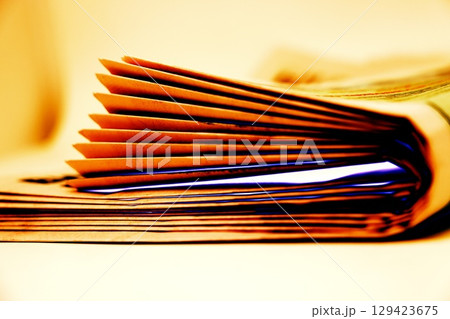 A stack of newspapers. They are ready for distribution to readers. A stack of newspapers. They are ready for distribution to readers. 129423675