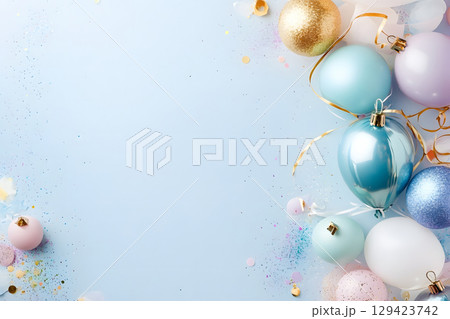 Fun and festive party scene with confetti and props, featuring blank space for celebration message or invitation text. 129423742