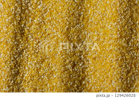 Raw Yellow Corn Grits Close-Up Texture Raw Yellow Corn Grits Close-Up Texture 129426028