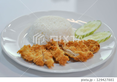 fried chicken or crispy chicken and rice or chicken and rice or Torikatsu or Chikinkatsu fried chicken or crispy chicken and rice or chicken and rice or Torikatsu or Chikinkatsu 129427881
