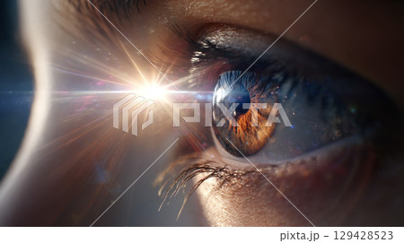 Beautiful, unusual, bright eye close-up with details of light blue iris. Ophthalmologist, buying glasses and optics, advertising vision 129428523
