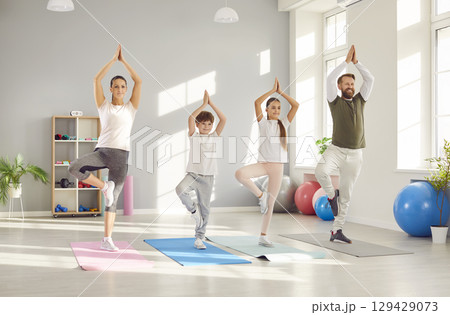 Parents And Children Working Out Together In The Gym Parents And Children Working Out Together In The Gym 129429073