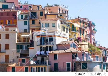 Colorful houses buildings. Manarola Italian village Cinque Terre, Liguria, Italy. Summer 129430550