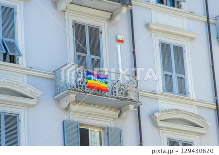 Rainbow Pace Flag. International Peace Day. Rainbow flag on the balcony Rainbow Pace Flag. International Peace Day. Rainbow flag on the balcony 129430620