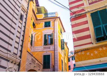 Colorful houses buildings. Monterosso Italian village. Cinque Terre narrow street architecture, Liguria, Italy. 129430668