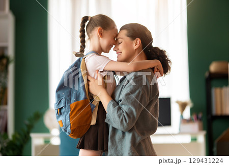 Happy family preparing for school Happy family preparing for school 129431224