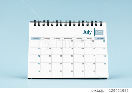 July 2026 Monthly desk calendar for 2026 year on soft blue color background. 129431925