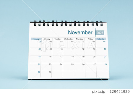 November 2026 Monthly desk calendar for 2026 year on soft blue color background. 129431929