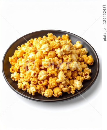 popcorn in a bowl isolated on white 129432488