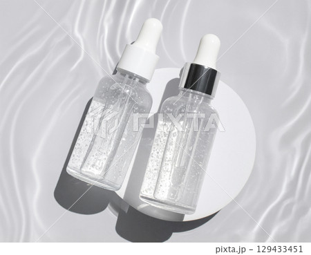 bottles with cosmetic cream 129433451