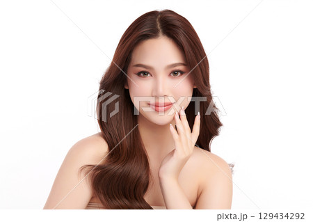 A beautiful young Asian woman with clean, fresh skin against a white background. Skincare, facial treatment, cosmetology, beauty, and spa. An elegant portrait of an Asian woman. A beautiful young Asian woman with clean, fresh skin against a white background. Skincare, facial treatment, cosmetology, beauty, and spa. An elegant portrait of an Asian woman. 129434292