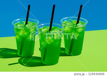 Refreshing Green Drinks with Ice Cubes 129436989