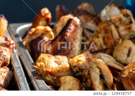 Grilled Chicken Wings on a Metal Tray 129438757
