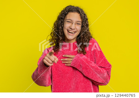 Amused smiling cheerful girl laughing out loud funny ridiculous joke anecdote bullying abuse 129440765