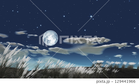 ススキの背景にぽっかりと浮かぶ満月　文字入れ用背景素材 129441966