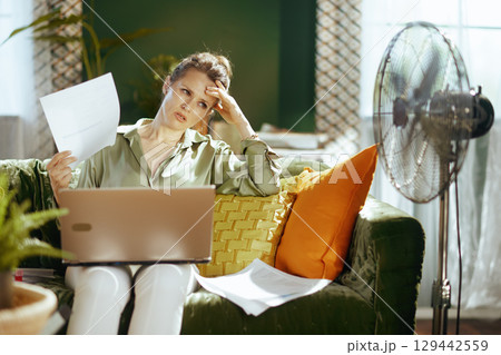 Woman Struggling with Home Office Heat & Stress 129442559