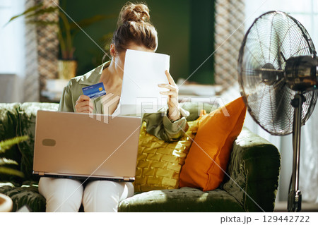 Convenient Home Finances with a Laptop 129442722