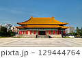 The National Theater in Taipei, Taiwan, is a grand traditional Chinese-style building located at Liberty Square, featuring a vivid orange roof, red columns, and intricate architectural details. 129444764