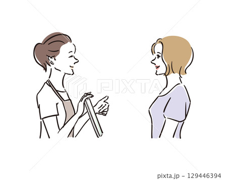 美容サロンでカウンセラーと相談する女性 129446394