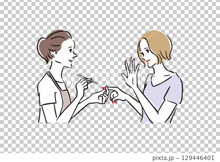 ネイルサロンで楽しそうに施術を受ける女性 129446401