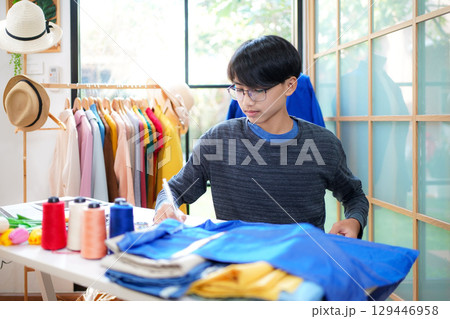 Trainee asian teenage man fashion designer vocation and education work Trainee asian teenage man fashion designer vocation and education work 129446958