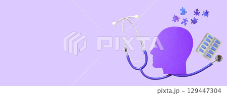 Stethoscope by purple head silhouette and blue puzzles 129447304
