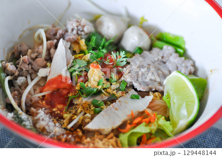 Chinese noodles with pork and eggl or noodles without soup or plain noodles Chinese noodles with pork and eggl or noodles without soup or plain noodles 129448144