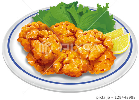 皿に盛り付けた唐揚げ 129448988
